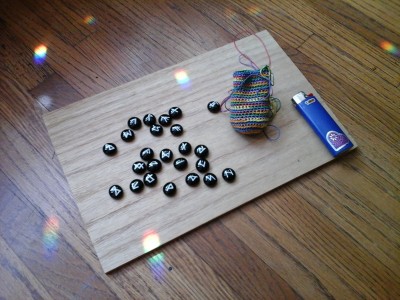 Tiny Runes with crochet bag, Bic lighter for contrast.